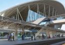 Write an e-mail to the railway booking clerk asking to reserve a seat for you