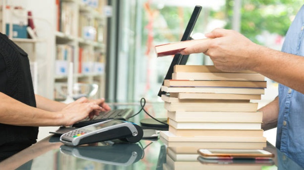 Write a dialogue between you and a book seller about buying a book